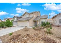Charming two-story home featuring desert landscaping, a tile roof, and an attached two-car garage at 3659 Gerri Bay Ln, Las Vegas, NV 89147
