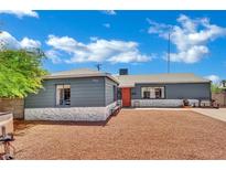 Charming single-story home showcasing its tidy front yard and appealing curb appeal under a bright sky at 4419 Lorna Pl, Las Vegas, NV 89107
