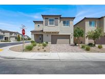 Charming two-story home with neutral colors, desert landscaping, and a two-car garage at 4630 Summer Azure St, North Las Vegas, NV 89031