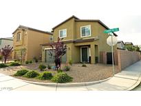 Charming two-story home featuring a well-maintained yard and a two-car garage at 9648 Spyglass Run Ave, Las Vegas, NV 89178