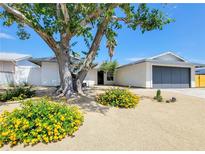 Charming single-story home featuring desert landscaping and a spacious two-car garage at 4072 E Harmon Ave, Las Vegas, NV 89121