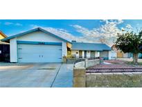 Charming single-story home with an attached two-car garage and a well-maintained front yard at 5368 Regal Ave, Las Vegas, NV 89146