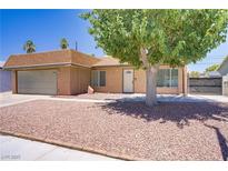 Charming single-story home featuring a low-maintenance front yard and attached garage at 6358 Meadow Lark Ln, Las Vegas, NV 89103