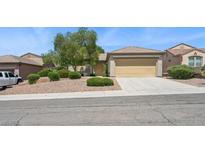 Charming single-story home featuring a well-maintained front yard with desert landscaping at 2026 Wildwood Lake St, Henderson, NV 89052
