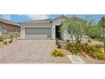 Charming single-story home with a well-maintained front yard and neutral color palette at 3024 River Brook Ct, Las Vegas, NV 89139