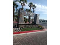 Beautiful stone sign at Sedona on the Boulevard with desert landscaping and palm trees at 9000 Las Vegas Blvd # 1142, Las Vegas, NV 89123
