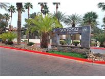 Stone sign welcomes you to Sedona on the Boulevard, a lushly landscaped community with mature palms at 9000 Las Vegas Blvd # 1142, Las Vegas, NV 89123