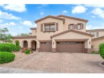 Charming two-story home featuring a two-car garage and well-maintained landscaping at 9614 Stonily Ln, Las Vegas, NV 89178