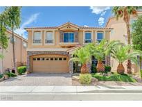 Stunning two-story home featuring a well-maintained lawn and a two-car garage at 9729 Hawk Crest St, Las Vegas, NV 89141