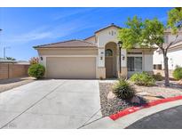 Charming single story home with a two car garage and low maintenance landscaping at 10613 Tiffanieville Ct, Las Vegas, NV 89129