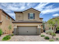 Charming two-story home featuring a two-car garage and well-maintained landscaping at 1425 Overseer Ave, Henderson, NV 89074