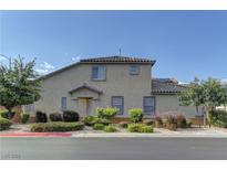Charming home with a well-maintained front yard and neutral color palette at 7919 Dexter Falls St, Las Vegas, NV 89149