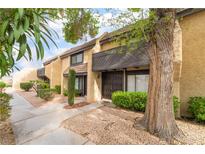 Charming townhome showcasing desert landscaping and a cozy, inviting front entryway at 3221 Yolanda Ln, Las Vegas, NV 89121