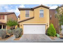 Charming two-story home with a two-car garage and well-maintained landscaping at 5641 Vassar Meadow St, Las Vegas, NV 89148