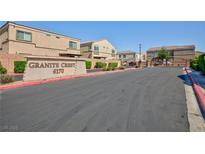 Granite Crest community entrance featuring desert landscaping and gated access at 6170 E Sahara Ave # 1076, Las Vegas, NV 89142