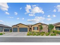 Charming single-story home with a two-car garage and manicured landscaping at 7036 Winstar St, Las Vegas, NV 89131