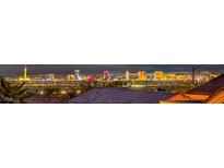 Stunning night view of the vibrant city skyline, showcasing the property's proximity to entertainment at 10921 Grand Haven Ave, Las Vegas, NV 89134