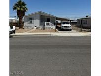 Charming single-story home with a covered carport and well-maintained front yard at 237 Piute Ln, Henderson, NV 89015
