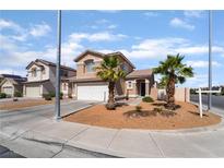 Charming two-story home with a well-manicured front yard and an attached two-car garage at 7288 Quarterhorse Ln, Las Vegas, NV 89148