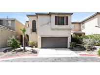 Charming two-story home with a two-car garage and landscaped front yard at 6591 Gertrude Ct, Las Vegas, NV 89141