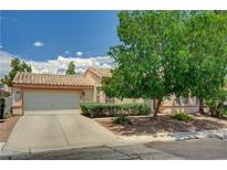 Charming single-story home with mature landscaping and a two-car garage, perfect for comfortable living at 7616 Yondering Ave, Las Vegas, NV 89131