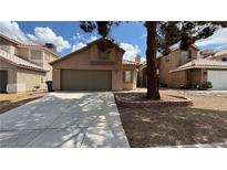 Charming single-Gathering home featuring a two-car garage and low-maintenance landscaping at 1081 Overture Dr, Las Vegas, NV 89123