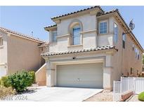 Two-story stucco home featuring a two car garage and tile roof at 11577 Vesuvio Ct, Las Vegas, NV 89183