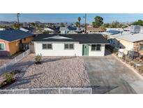 Charming single-story home with fresh exterior paint and desert landscaping at 1436 Chestnut St, Henderson, NV 89011