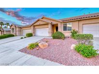 Charming single story home featuring desert landscaping, attached garage and inviting curb appeal at 200 Teller St, Henderson, NV 89074