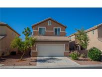 Charming two-story home with a two-car garage and well-maintained landscaping in a quiet neighborhood at 5216 Loma Verde Ave, Las Vegas, NV 89108