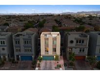 Charming multi-level townhouse featuring modern architecture and desert landscaping in a well-planned community at 8055 Haywood Estate Ave, Las Vegas, NV 89113
