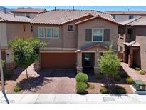 Charming two-story home featuring a two-car garage, covered entry, and low-maintenance landscaping at 8131 Skye Plum St, Las Vegas, NV 89166