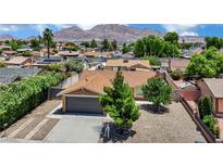 Charming single-story home with a well-maintained yard and mountain views at 317 Kane Ave, Las Vegas, NV 89110
