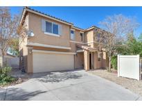 Charming two-story house with a spacious driveway, two-car garage, and inviting curb appeal at 6068 Conroe Ct, Las Vegas, NV 89118