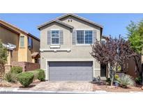 Charming two-story home featuring a gray color palette and a two-car garage at 7720 Houston Peak St, Las Vegas, NV 89166