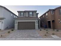 Charming two-story home featuring a paved driveway and a two-car garage at 4266 Yucca Brevi Ave, Las Vegas, NV 89139