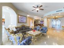 Formal living room boasting luxurious seating, elegant lighting and marble flooring at 9101 Alta Dr # 301, Las Vegas, NV 89145