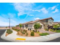 Charming single-story home with desert landscaping and a well-maintained exterior in a sunny setting at 2845 Mincio St, Henderson, NV 89044