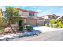 Charming two-story home with a three-car garage and well-maintained landscaping at 3309 Green Ice Ave, North Las Vegas, NV 89081