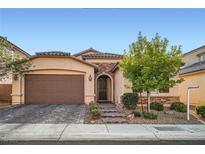 Charming single-Gathering home with a well-manicured front yard and a two-car garage in a quiet neighborhood at 6233 Canterbury Field Rd, Las Vegas, NV 89113