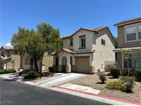 Charming two-story home featuring an attached garage and well-maintained landscaping at 7226 Freedom Ring St, Las Vegas, NV 89148