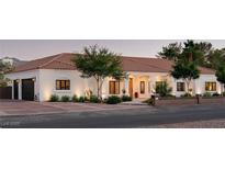 Charming single-story home with desert landscaping and a red tile roof at 7745 Radcliff St, Las Vegas, NV 89123