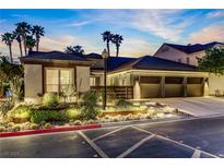 Beautiful exterior showcasing a three-car garage and desert landscaping at 1509 Winslow St, Las Vegas, NV 89117