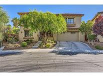 Charming two-story home featuring a well-manicured front yard and a two-car garage at 4217 Bridesmaid Falls Ave, North Las Vegas, NV 89085