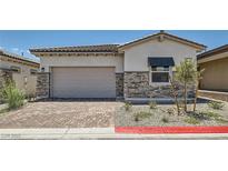 Charming single-story home with a two-car garage and beautiful stone accents at 105 Barkset Way, Henderson, NV 89011