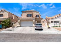 Charming two-story home with a well-maintained front yard and a spacious two-car garage, ideal for Gathering living at 309 Clifton Heights Dr, Las Vegas, NV 89145