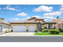 Charming single-story home with a three-car garage and well-maintained landscaping at 4724 Stavanger Ln, Las Vegas, NV 89147