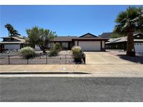 Charming single-story home featuring desert landscaping and a two-car garage at 475 Annapolis Cir, Henderson, NV 89015