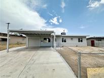 Charming single-story home with a covered carport and freshly painted exterior at 4924 Carmen Blvd, Las Vegas, NV 89108