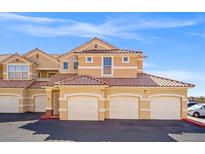 Beautiful condominium featuring a three-car garage, a tile roof, and a well maintained exterior at 5855 Valley Dr # 2130, North Las Vegas, NV 89031